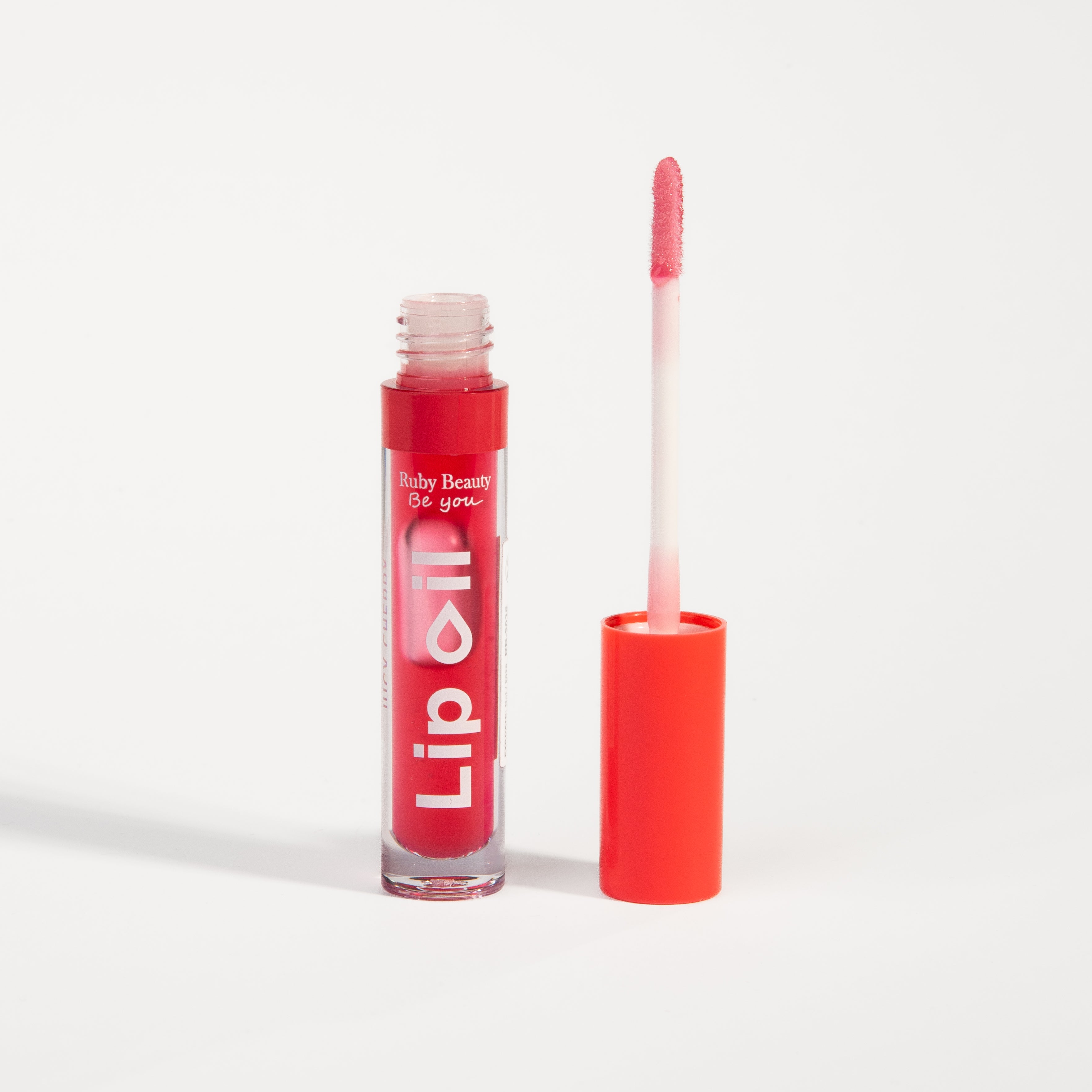 Ruby Beauty Lip Oil in Juicy Cherry β opened with gloss wand