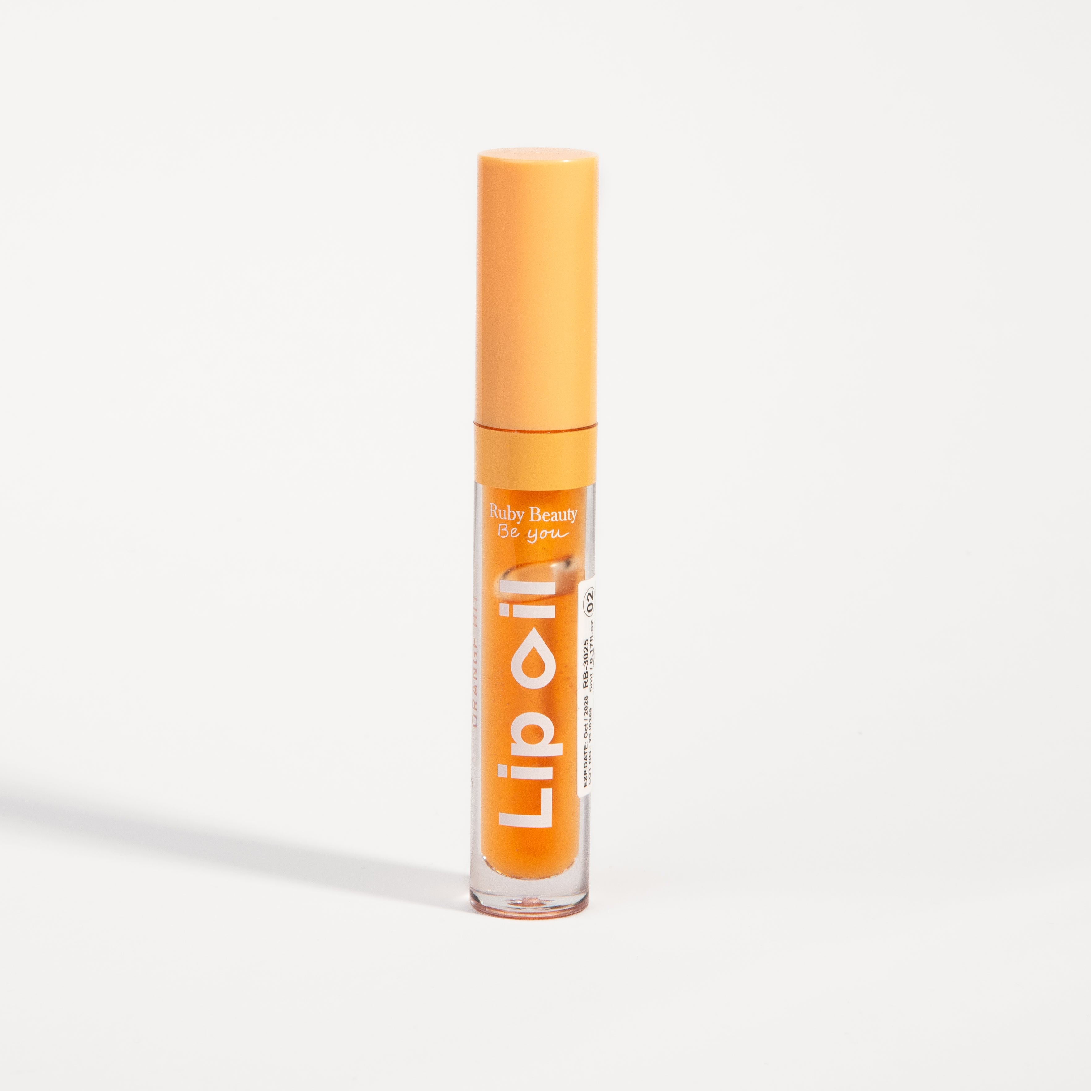 Ruby Beauty Lip Oil in Orange Hit β closed tube, plant-based hydration