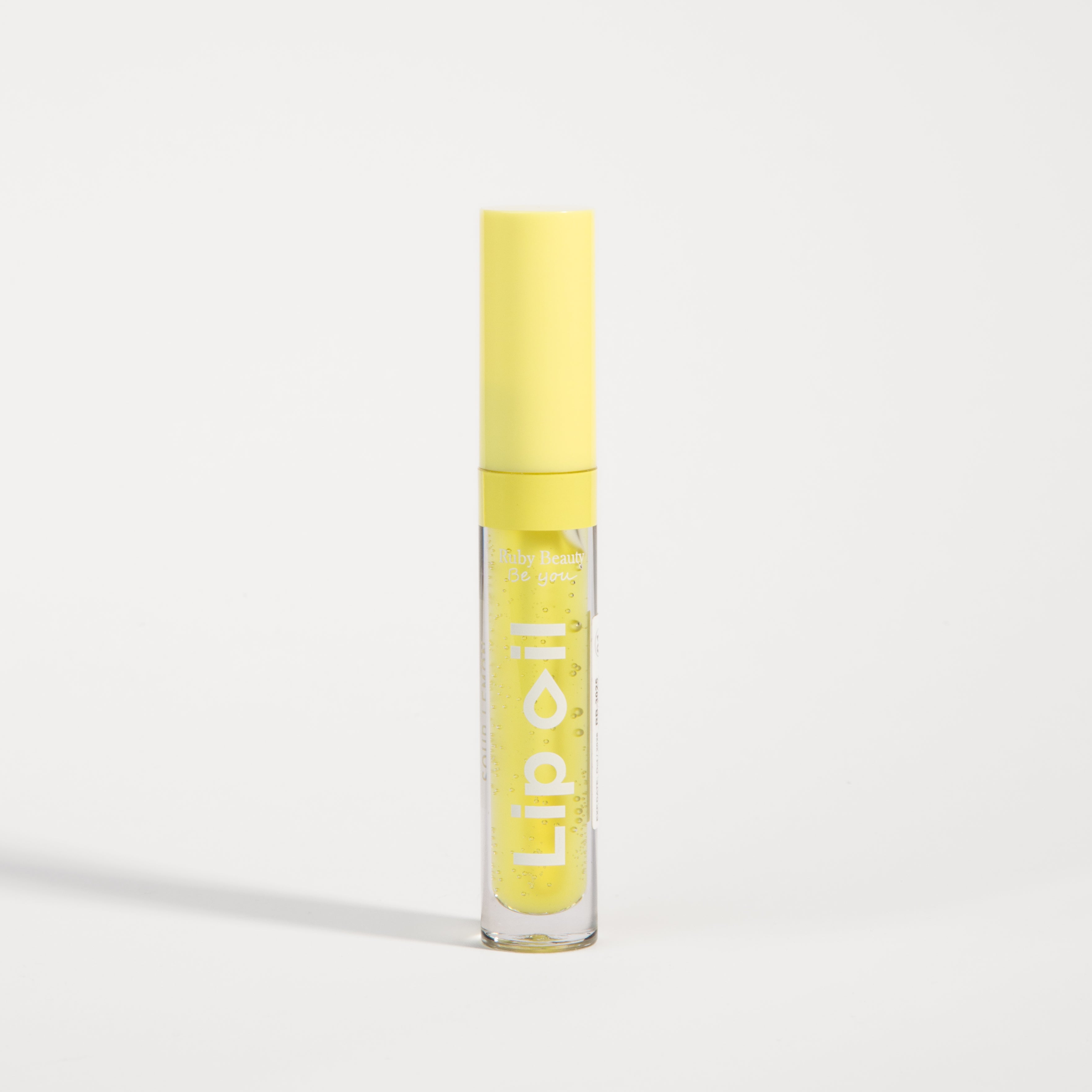 Ruby Beauty Lip Oil in SOUR LEMON β closed tube, plant-based hydration
