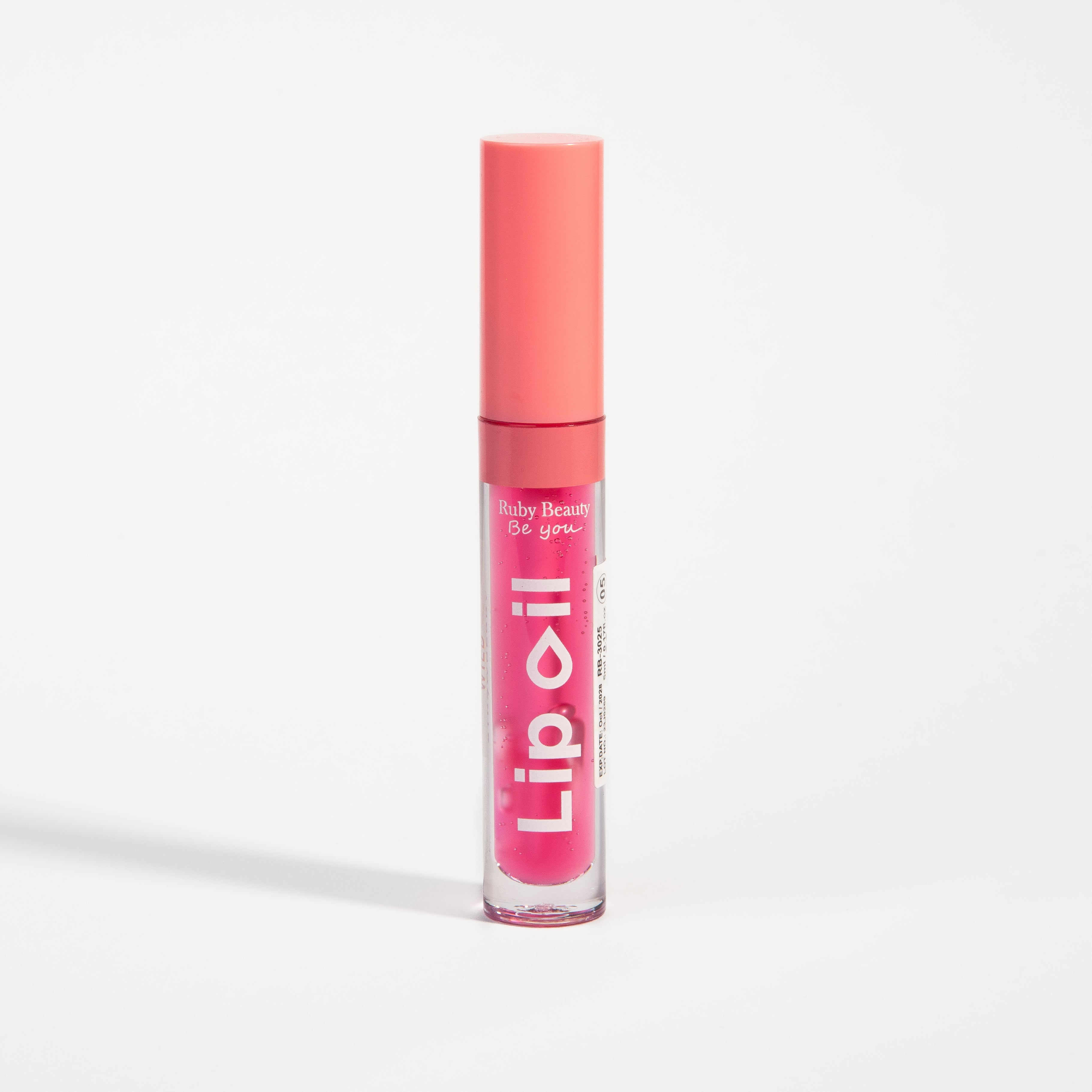 Ruby Beauty Lip Oil in Watermelon Boom β vibrant pink closed packaging