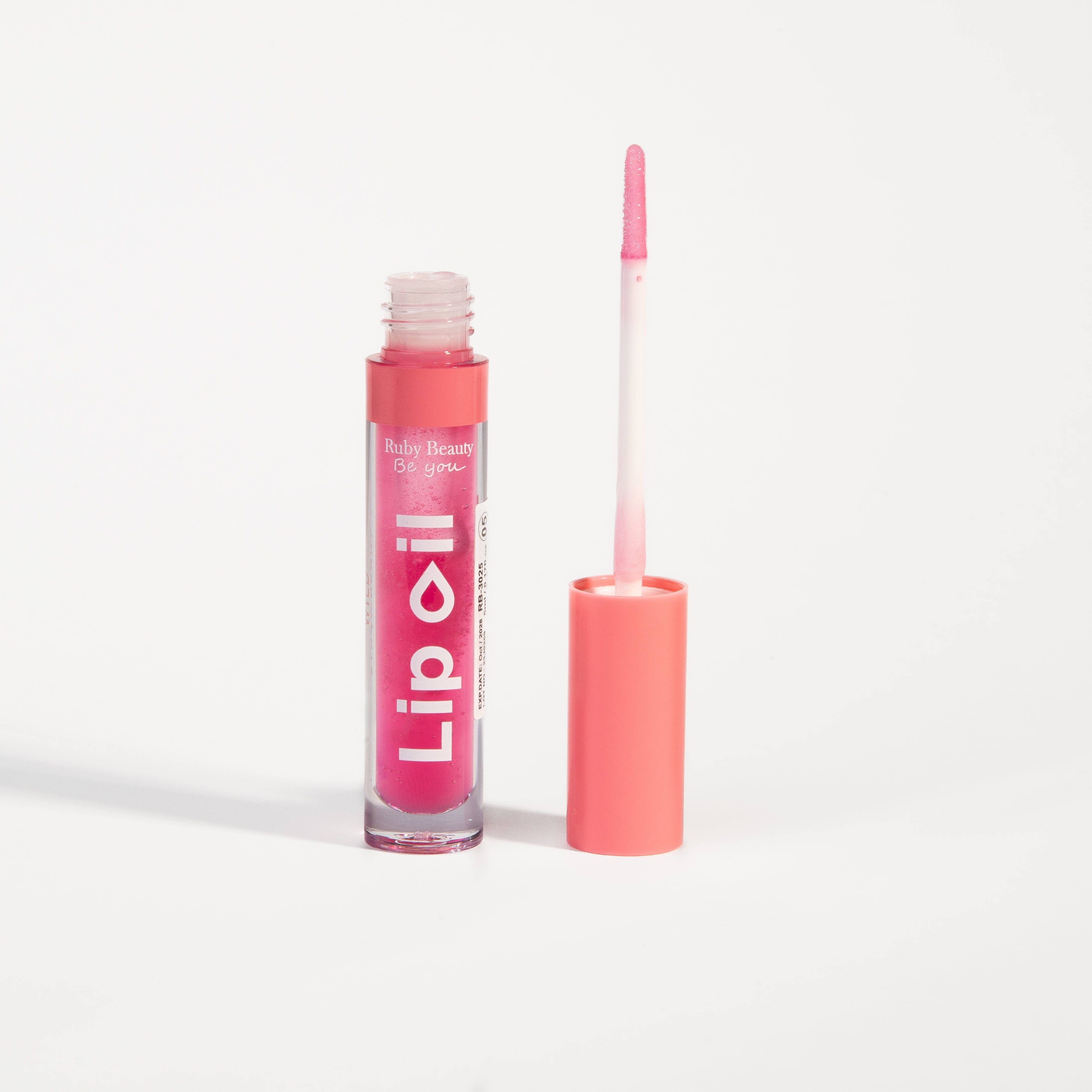Ruby Beauty Lip Oil in Watermelon Boom β open tube with gloss wand