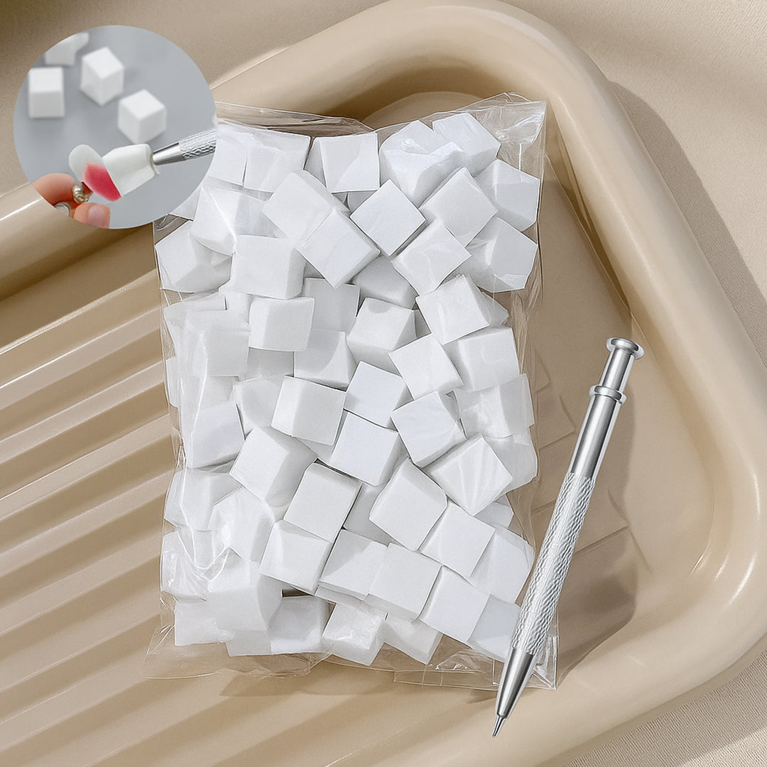 Pack of nail art sponge cubes with metal handle shown on tray.