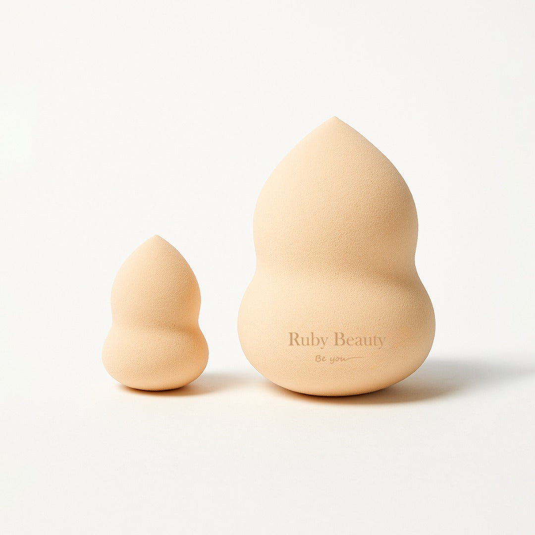 Side view of Ruby Beauty big and small makeup sponge duo