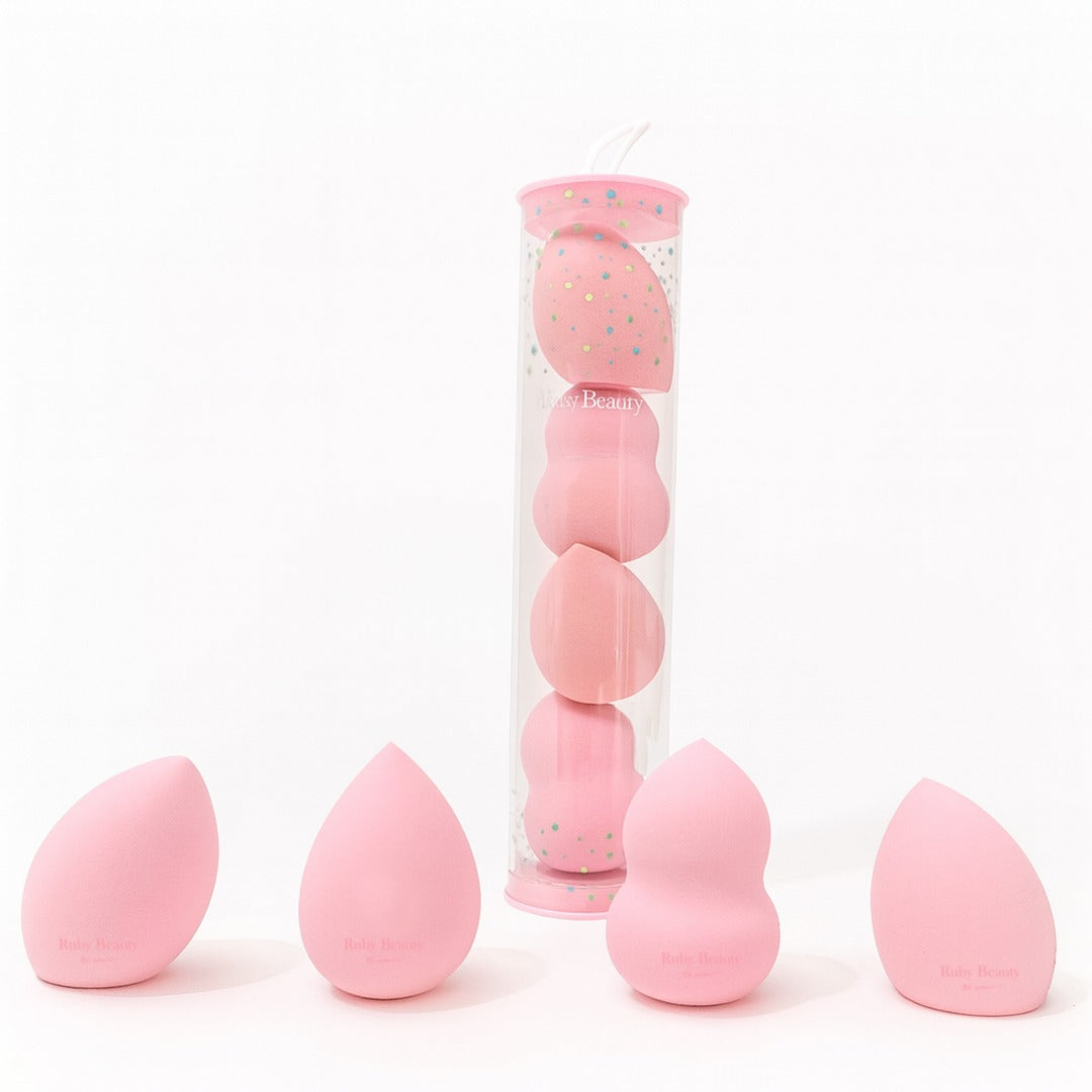 Ruby Beauty 4-piece pink makeup sponge set with different shapes for blending foundation, contour, and concealer.