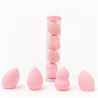 Ruby Beauty 4-piece pink makeup sponge set with different shapes for blending foundation, contour, and concealer.