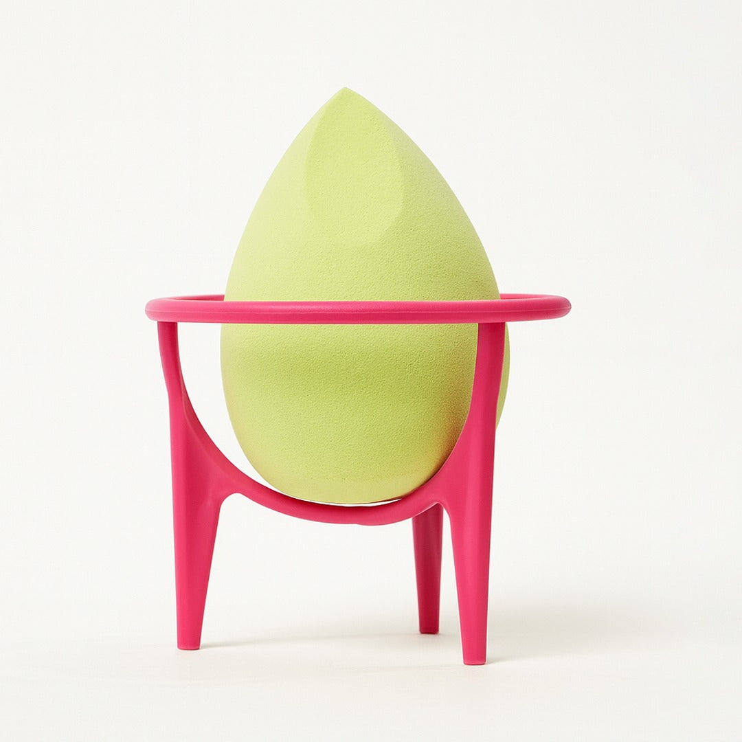 Ruby Beauty green makeup sponge with pink holder for blending foundation and concealer