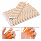 Soft wooden nail art cotton swabs used for manicure cleanup and polish detailing.